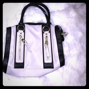 Tan and black Steve Madden hand bag
